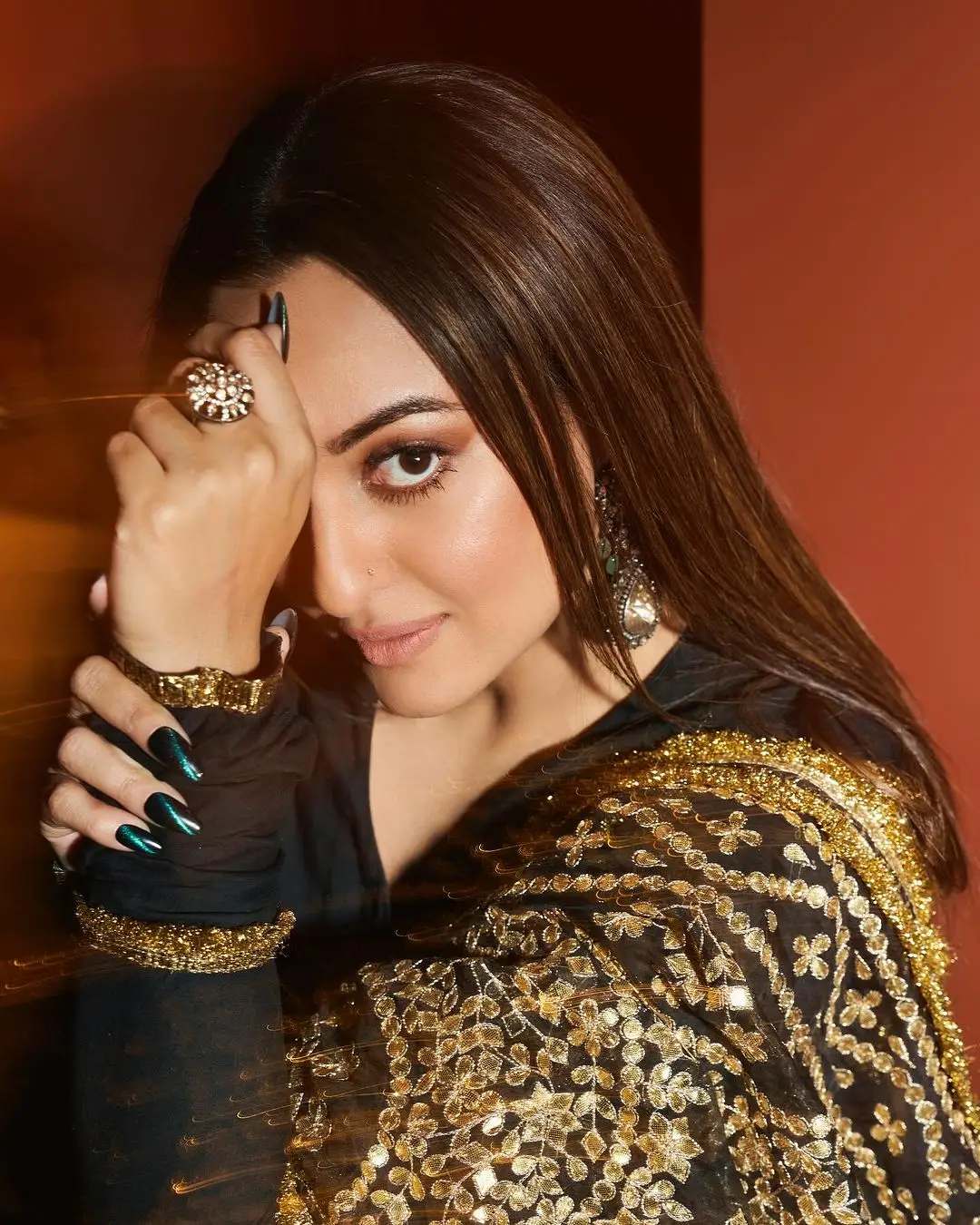 SONAKSHI SINHA STILLS IN BEAUTIFUL EARRINGS JEWELLERY BLACK GOWN